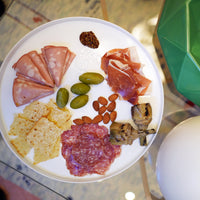 Side view of Alta Cucina 12.5" x 0.75" Opal Glass Large Stacking Plate (Set of 12)