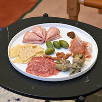 Side view of Alta Cucina 12.5" x 0.75" Opal Glass Large Stacking Plate (Set of 12)