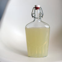 Side view of Fiaschetta Glass Pocket Flask Leak Proof