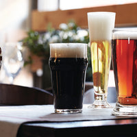 Side view of Nonix 19.75 oz. Stackable Pub Beer Glasses (Set of 12)