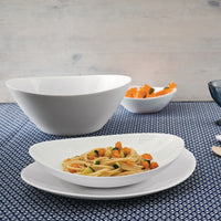 Side view of Prometeo 9.75" x 9.5" Opal Glass Salad Bowl (Set of 12)