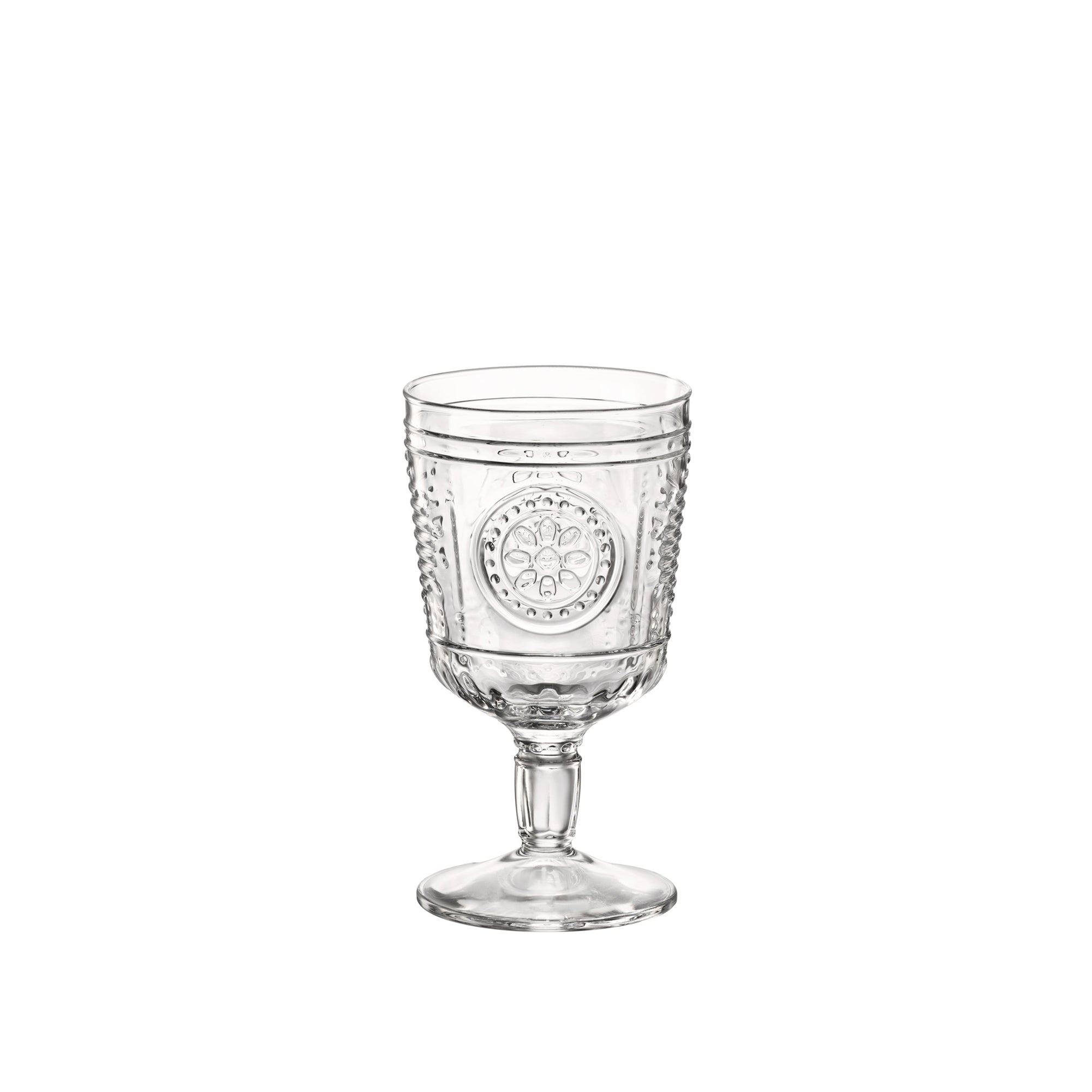 A clear glass with a Victorian-inspired design, featuring intricate embossed patterns and a wide mouth.